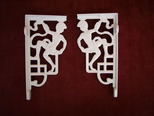 White ornate brackets for high cistern or basin White ornate brackets for high cistern or basin
